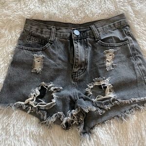 Black jean shorts with rips
